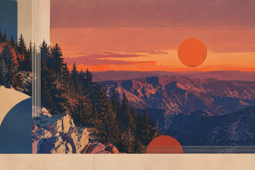 The Sandia Mountains glowing orange and pink at sunset above a forested ridge